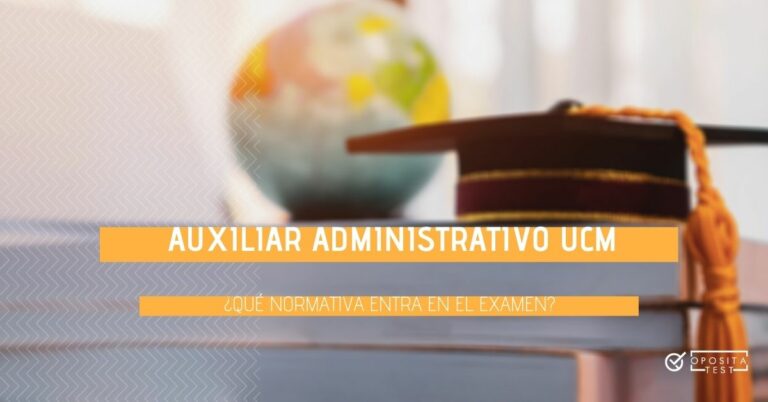 Imagen fuera de foco con birrete de graduado y globo terráqueo para ilustrar un post en el que se analiza la normativa que entra en el examen de auxiliar administrativo de la universidad complutense de Madrid (UCM)