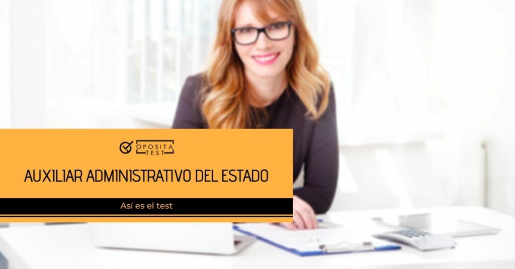 Persona con pelo claro largo y gafas de montura oscura ante ordenador y papeles con gráficos con el printer "Auxiliar Administrativo del Estado, así es el test"