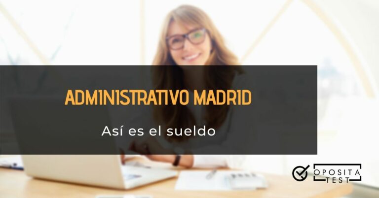 Imagen genérica de personas con cabellos de color claro y lentes de pasta negra trabajando en ordenador portátil blanco para acompañar una información en la que se analiza el sueldo de los administrativos de la Comunidad Autónoma de Madrid