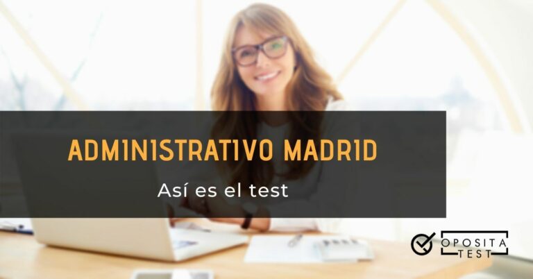 Imagen fuera de foco de profesional en entorno de oficina con cabello largo y lentes de pasta negra usando ordenador portátil blanco para acompañar una entrada en la que se analiza la estructura del test a Administrativo de la Comunidad Autónoma de Madrid