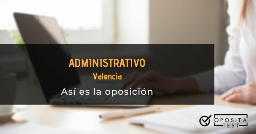 Imagen fuera de foco de persona en camisa blanca en oficina usando un ordenador para acompañar e ilustrar un post en el que se analiza cómo es la oposición a Administrativo de la Generalitat Valenciana en Valencia