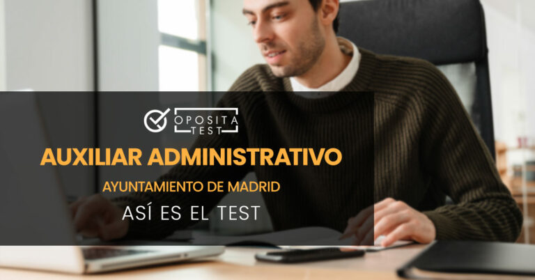 Hombre manejando un portátil con una mano y con la otra tmando notas en un cuaderno. Toda la imagen está fuera de foco. Se utiliza para ilustrar una entrada sobre el test de Auxiliar Administrativo del Ayuntamiento de Madrid.